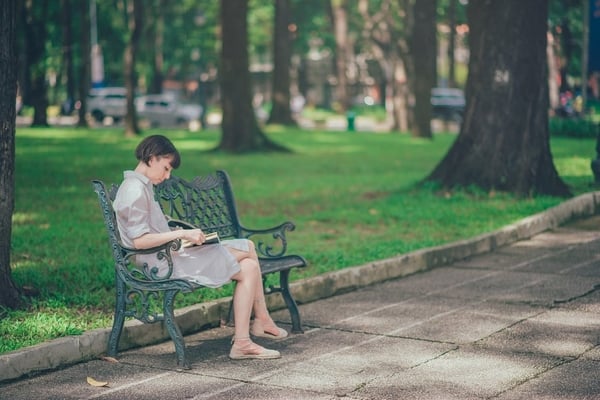 woman reading a book outdoor